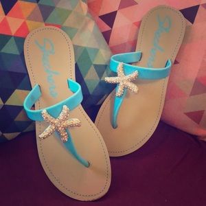 Teal Starfish Flip Flops